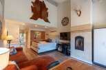 Experience rustic charm and modern comfort in this spacious studio apartment.