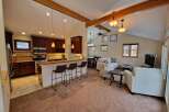 Experience the perfect blend of modern comfort and rustic charm in this open-concept living space.