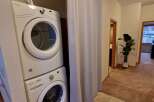 Discover convenience with this stacked Whirlpool washer and dryer set, perfect for maximizing space in your laundry area.