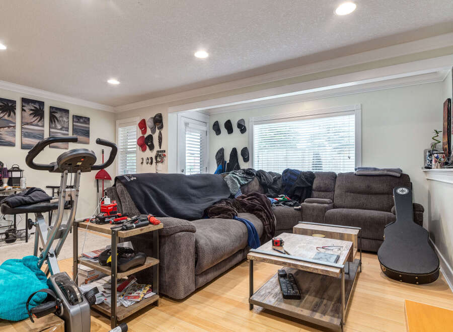 This spacious living area features a comfortable sectional sofa perfect for relaxation and entertainment.