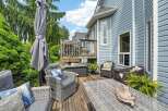 Enjoy outdoor living on this charming deck, perfect for entertaining or relaxing.