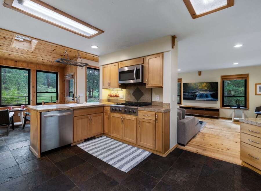 Experience the perfect blend of rustic charm and modern convenience in this stunning kitchen.