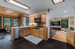 Experience the perfect blend of rustic charm and modern convenience in this stunning kitchen.