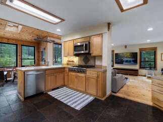 Experience the perfect blend of rustic charm and modern convenience in this stunning kitchen.