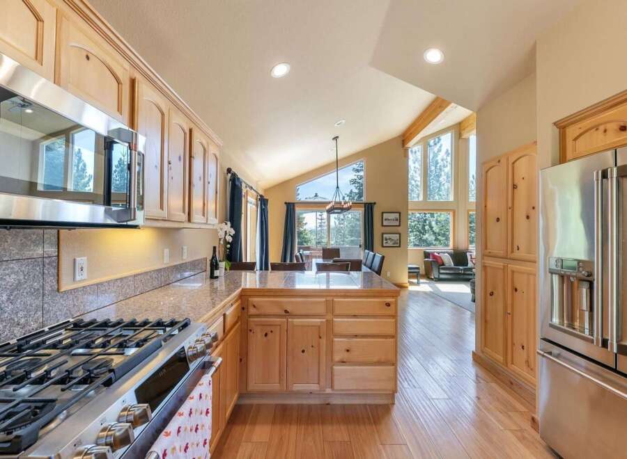 Experience the perfect blend of rustic charm and modern convenience in this stunning kitchen.