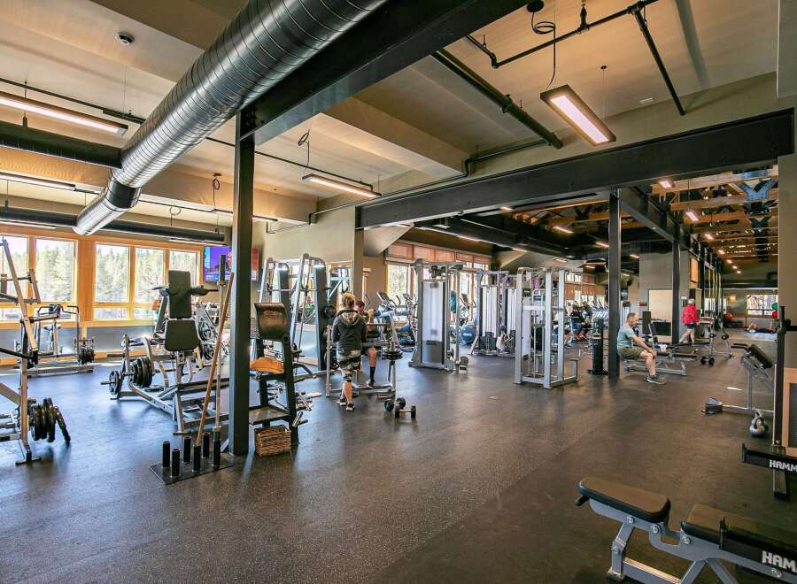 Experience a healthy lifestyle in this state-of-the-art fitness center, featuring a wide array of modern weight machines and cardio equipment.