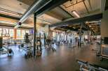 Experience a healthy lifestyle in this state-of-the-art fitness center, featuring a wide array of modern weight machines and cardio equipment.