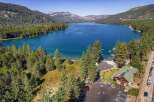 Experience the ultimate lakeside lifestyle with this stunning property offering direct access to a pristine blue lake.
