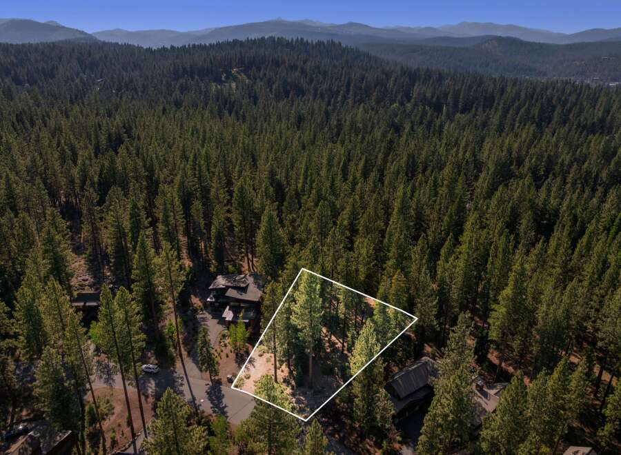 Discover this stunning property nestled within a serene forest landscape, offering unparalleled privacy and natural beauty.