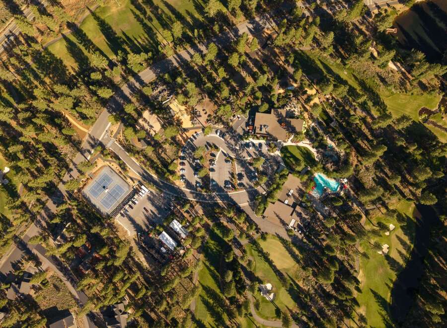 Experience luxury living with this stunning aerial view of a resort-style property.