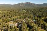Discover this stunning mountain retreat nestled amidst a dense pine forest, offering a serene escape.