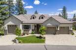 Discover this stunning single-story home featuring a charming courtyard entrance and a spacious three-car garage.