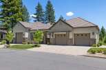 Discover this stunning single-story home featuring a modern stucco exterior and a welcoming courtyard entrance.
