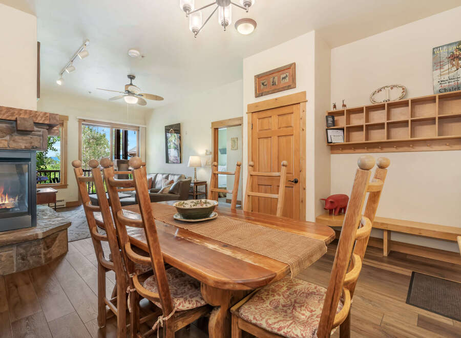 Gather around the rustic dining table, perfect for family meals after a day of adventure.