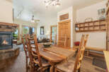 Gather around the rustic dining table, perfect for family meals after a day of adventure.