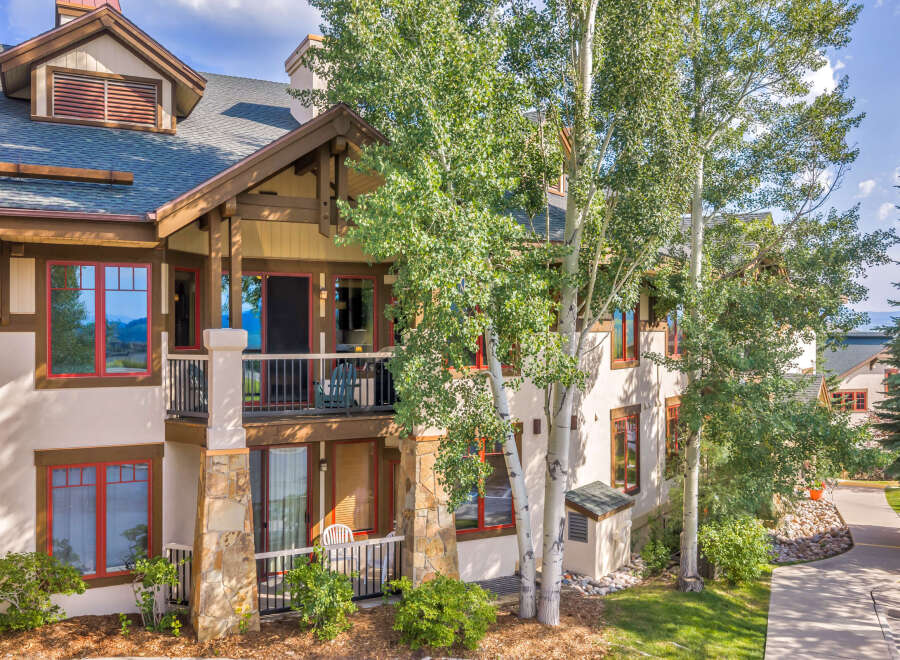 Experience mountain living in this charming property featuring a multi-level design with balconies offering scenic views.