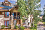 Experience mountain living in this charming property featuring a multi-level design with balconies offering scenic views.