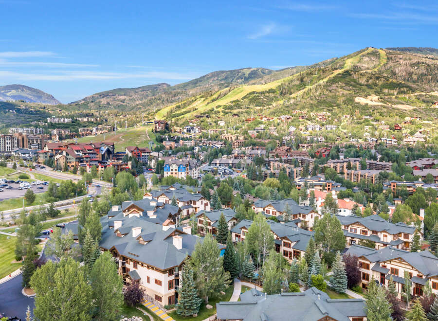 Discover this stunning mountain resort property, offering a picturesque setting amidst lush greenery and rolling hills.