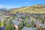 Discover this stunning mountain resort property, offering a picturesque setting amidst lush greenery and rolling hills.