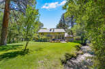 Experience serene living with this stunning property featuring a spacious backyard and a tranquil creek.