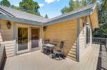 Enjoy outdoor living on this spacious deck, perfect for morning coffee or evening relaxation.