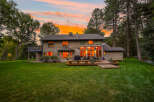 Experience luxurious living in this stunning home featuring a spacious backyard with a multi-level deck perfect for entertaining.