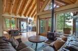 Experience rustic charm and modern comfort in this stunning log cabin living space.