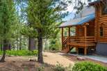 Escape to this stunning log cabin nestled amidst a serene pine forest.