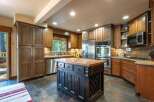 Experience the perfect blend of rustic charm and modern convenience in this stunning kitchen.