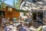 Enjoy outdoor living on this spacious wooden deck, perfect for entertaining or relaxing.