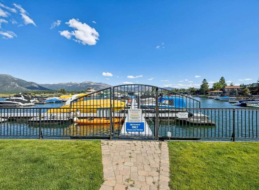 Enjoy exclusive access to this private marina, featuring a secure gate and ample boat slips for residents.