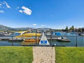 Enjoy exclusive access to this private marina, featuring a secure gate and ample boat slips for residents.
