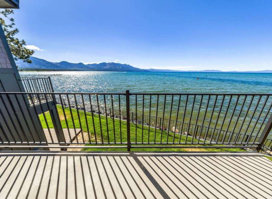 Experience breathtaking lake views from this stunning property's private balcony, perfect for enjoying your morning coffee or evening sunsets.