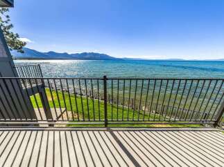 Experience breathtaking lake views from this stunning property's private balcony, perfect for enjoying your morning coffee or evening sunsets.