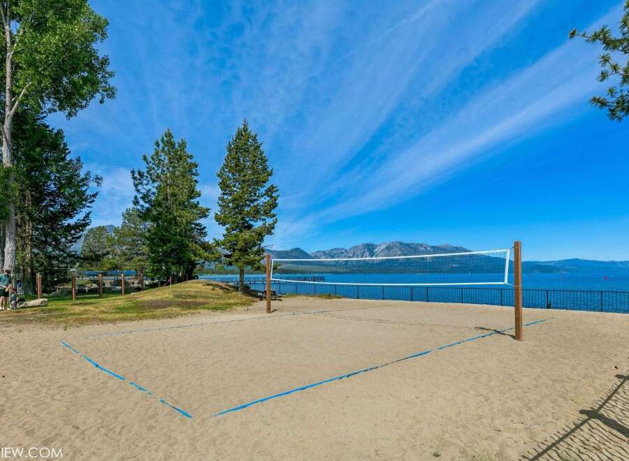 Enjoy outdoor recreation with this beautiful beach volleyball court, perfect for summer fun.