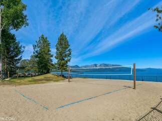 Enjoy outdoor recreation with this beautiful beach volleyball court, perfect for summer fun.