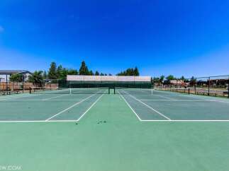 Enjoy outdoor recreation with these pristine tennis courts, perfect for a friendly match or practice session.