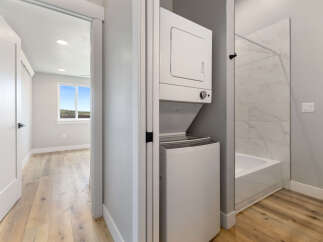 Discover modern living with this beautifully appointed apartment, featuring a convenient in-unit stacked washer and dryer.