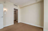 Step into this inviting room featuring a neutral color palette and plush carpeting, creating a serene atmosphere.