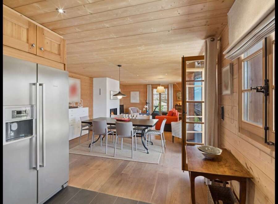 Experience rustic charm and modern comfort in this beautifully appointed dining and living area.