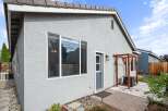 Discover this charming home featuring a stucco exterior and a durable tile roof.