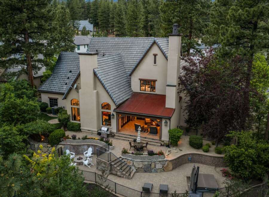 Experience luxurious outdoor living with this stunning property, featuring a spacious patio area perfect for entertaining.