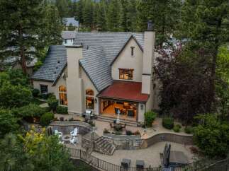 Experience luxurious outdoor living with this stunning property, featuring a spacious patio area perfect for entertaining.