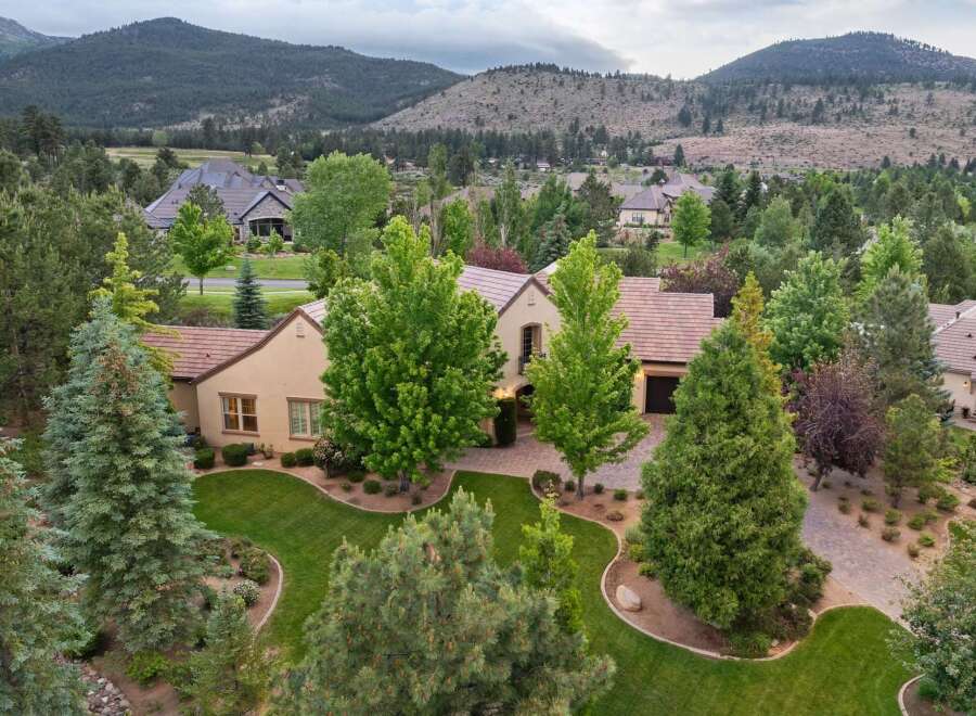 Nestled amidst lush greenery and rolling hills, this stunning estate offers a luxurious retreat.