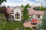 Experience luxury living in this stunning home featuring a spacious backyard patio perfect for entertaining.
