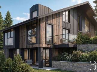 Experience modern luxury in this stunning home featuring a striking blend of natural wood and dark metal siding.