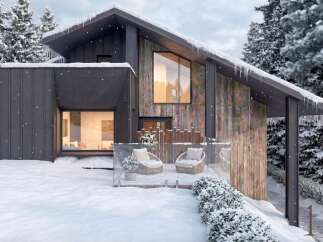 Experience modern mountain living in this stunning architectural home, nestled amidst a serene winter landscape.