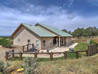 Discover this charming home featuring a spacious patio perfect for outdoor entertaining, complemented by a fenced yard offering privacy and security.