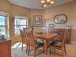 This dining room features a warm and inviting atmosphere, perfect for family gatherings.