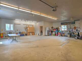 Discover this spacious garage, perfect for all your storage and workshop needs.